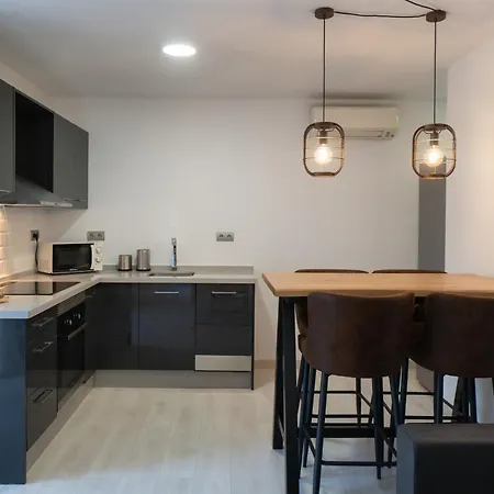 Апартаменти Sur Palmeras *